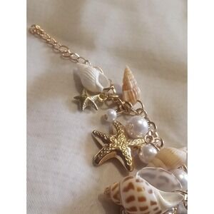 Gold Color And Seashell Bracelet